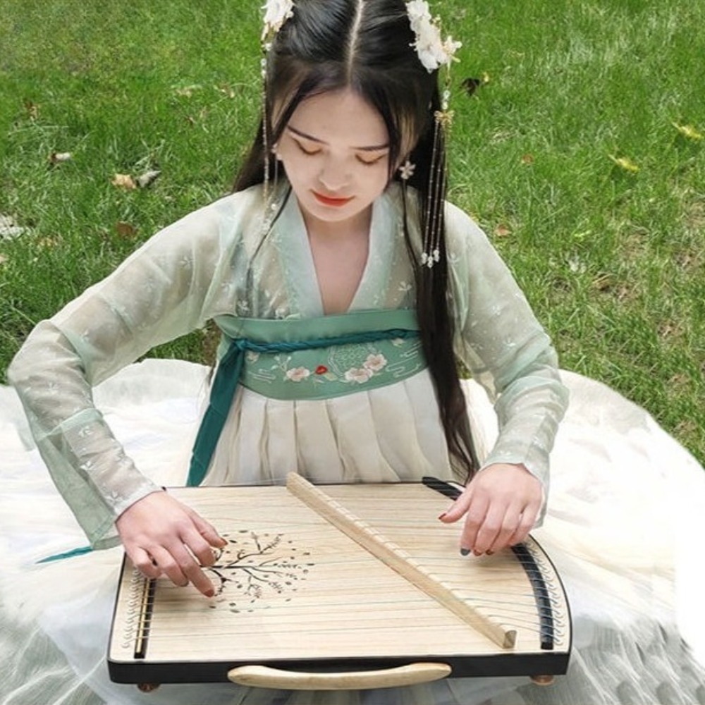 جهاز تدريب تقنية الإصبع الاحتر - مراجعة Musical Instrument Guzheng وسعره